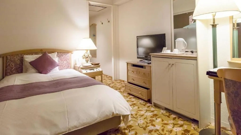 Bed in Miyazaki Kanko Hotel