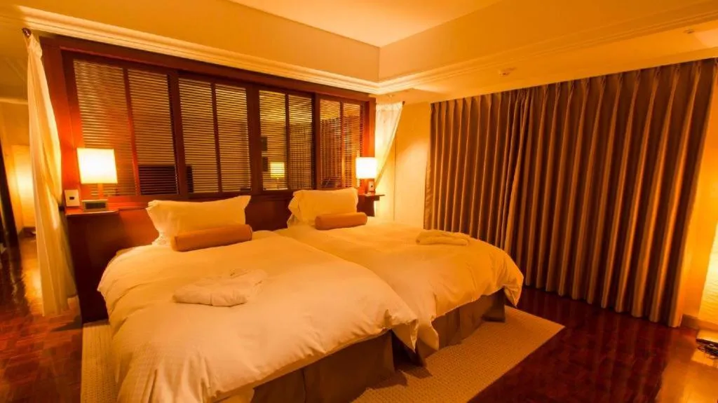 Bed in Miyazaki Kanko Hotel