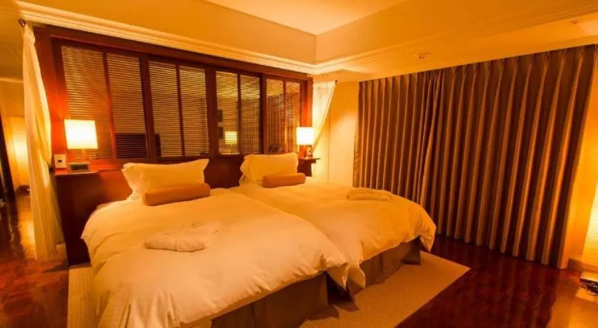 Bed in Miyazaki Kanko Hotel