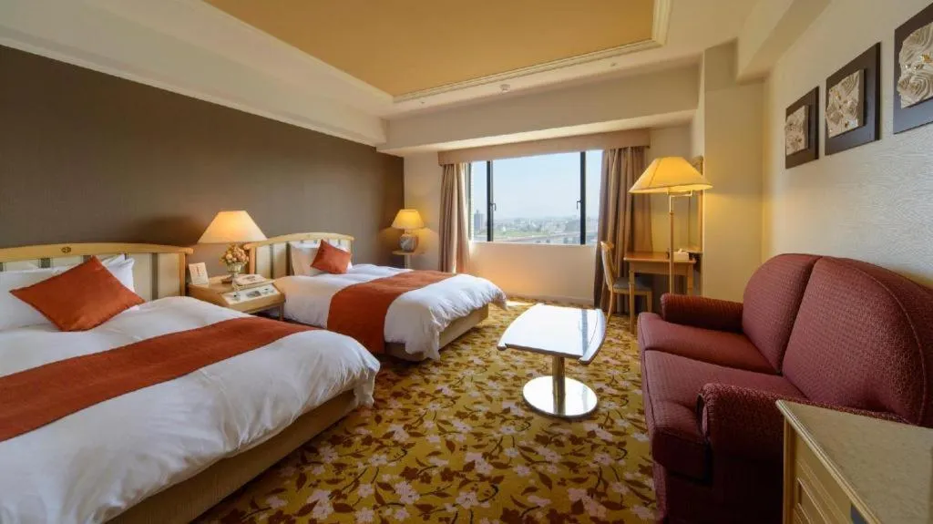 Bed in Miyazaki Kanko Hotel