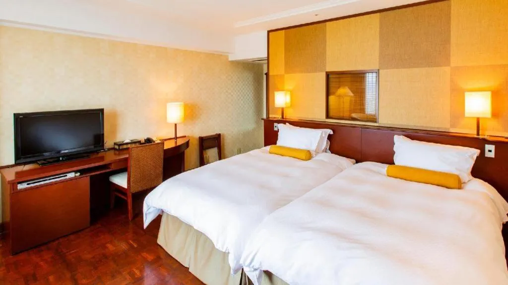 Bed in Miyazaki Kanko Hotel