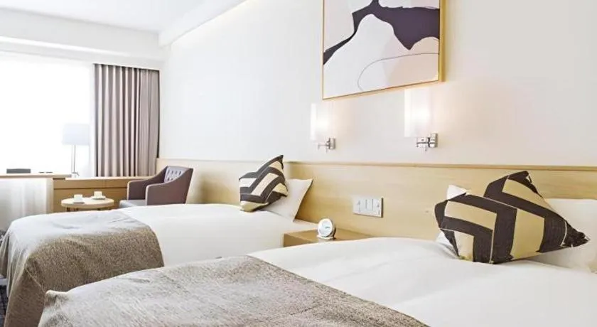 Bed in Miyazaki Kanko Hotel