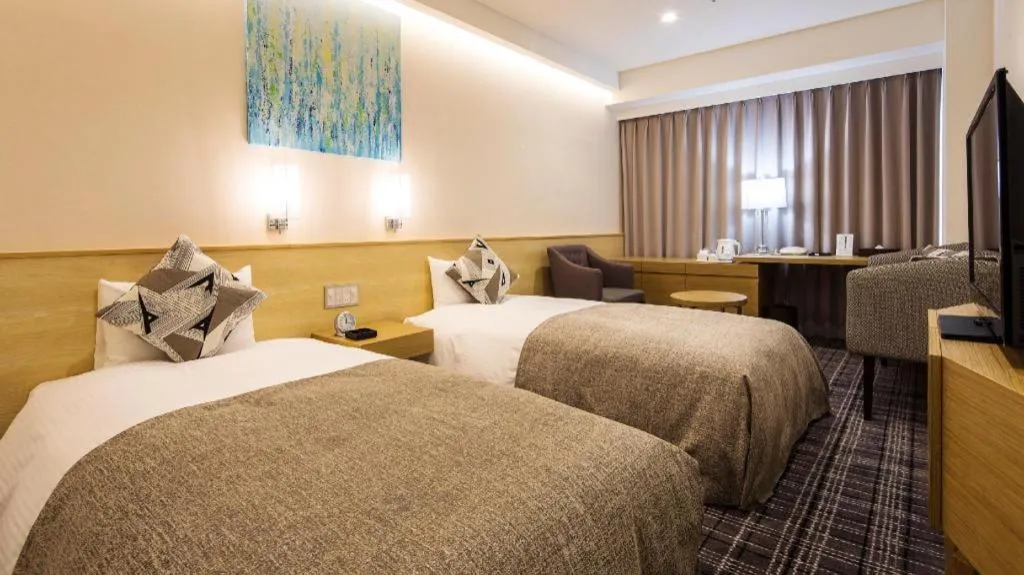 Bed in Miyazaki Kanko Hotel