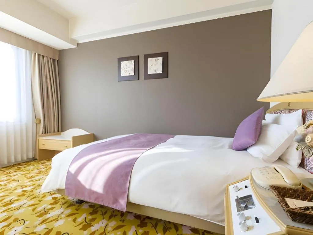 Bed in Miyazaki Kanko Hotel