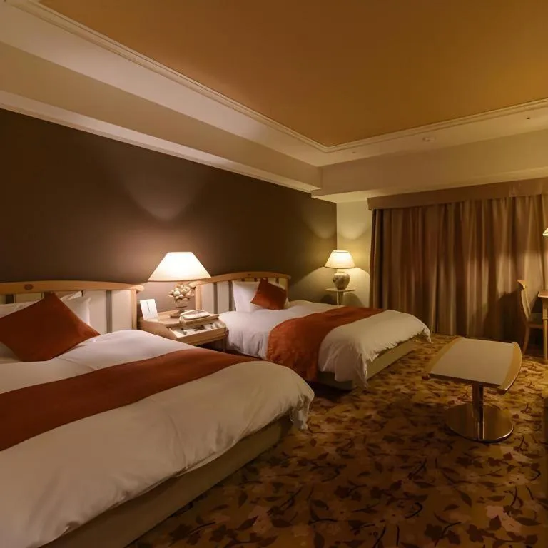 Bed in Miyazaki Kanko Hotel