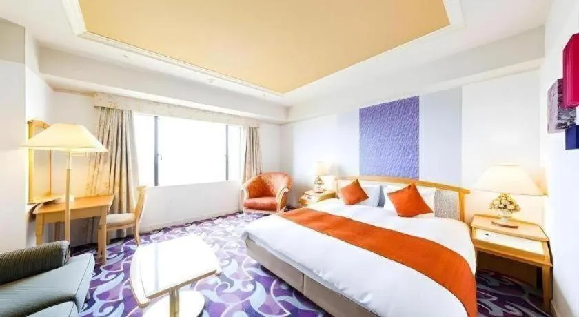 Bed in Miyazaki Kanko Hotel