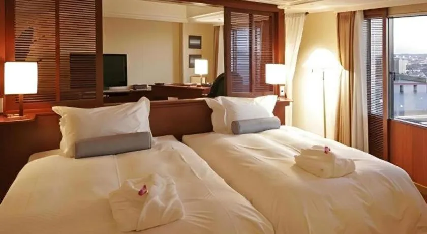 Bed in Miyazaki Kanko Hotel