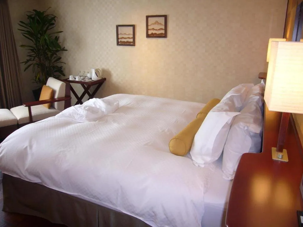 Bed in Miyazaki Kanko Hotel