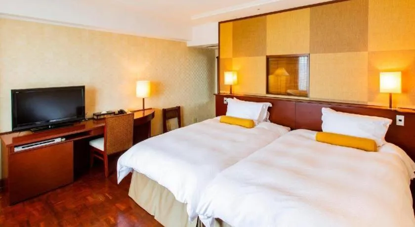 Bed in Miyazaki Kanko Hotel