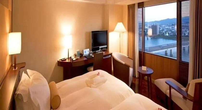 Bed in Miyazaki Kanko Hotel