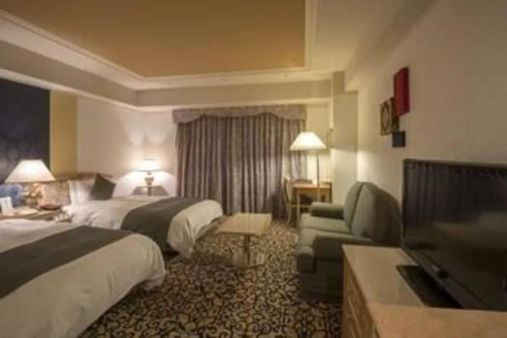 Bed in Miyazaki Kanko Hotel