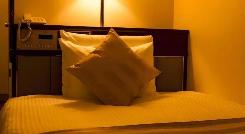 Bed in Miyazaki Kanko Hotel