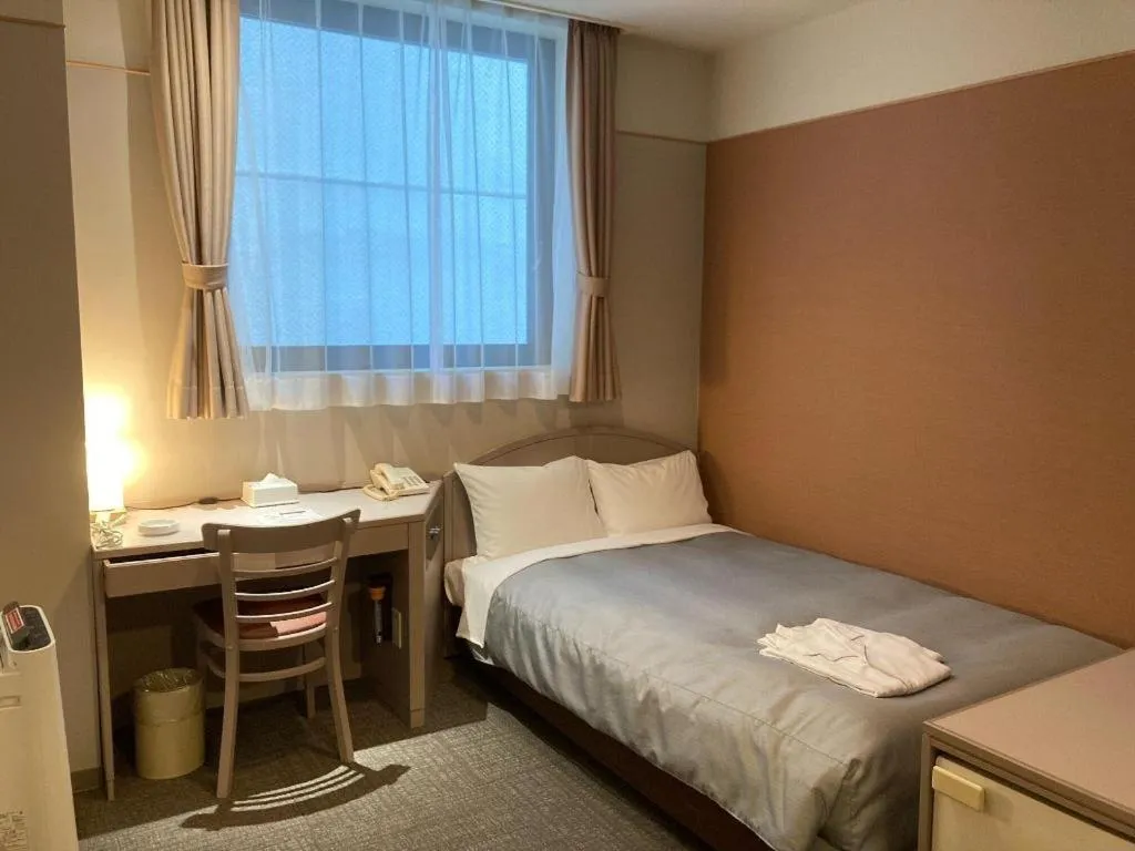 Bed in The Hamilton Sapporo Hotel