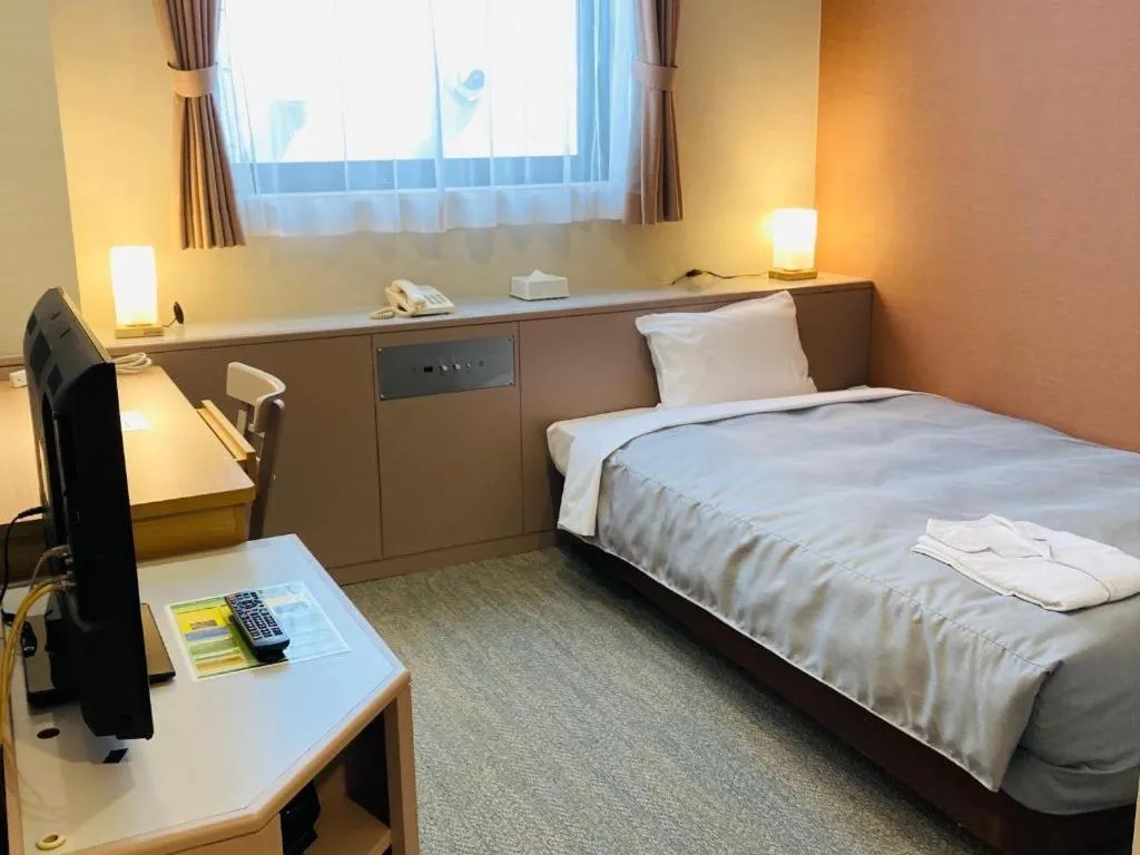 Bed in The Hamilton Sapporo Hotel