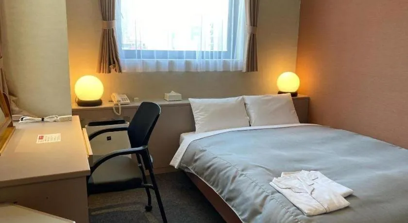 Bed in The Hamilton Sapporo Hotel