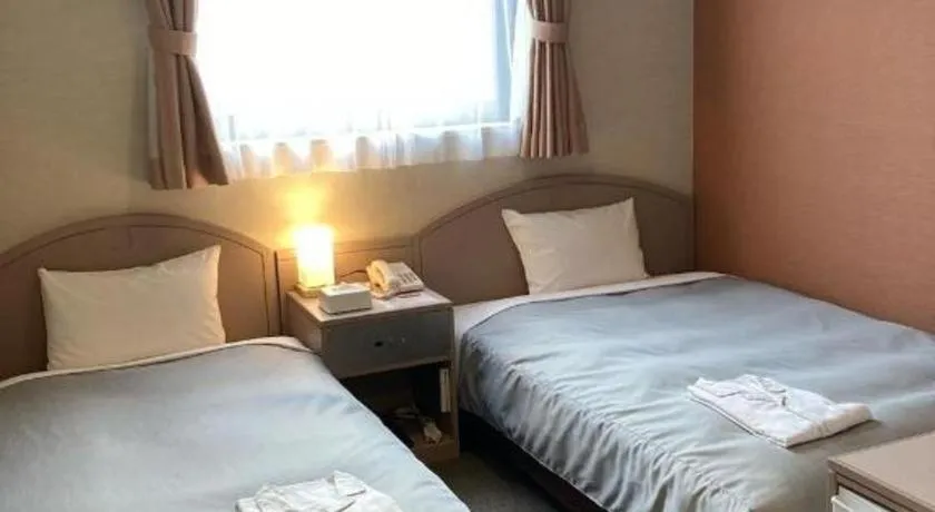 Bed in The Hamilton Sapporo Hotel