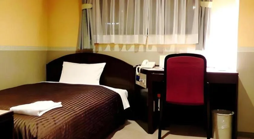 Bed in The Hamilton Sapporo Hotel