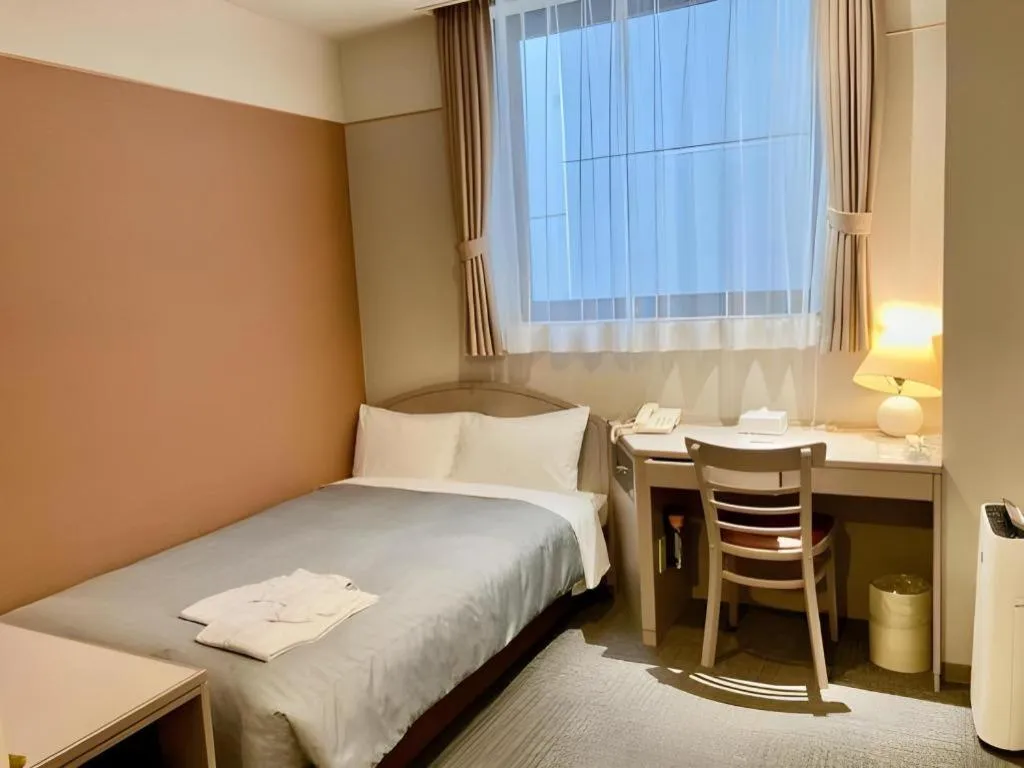 Bed in The Hamilton Sapporo Hotel