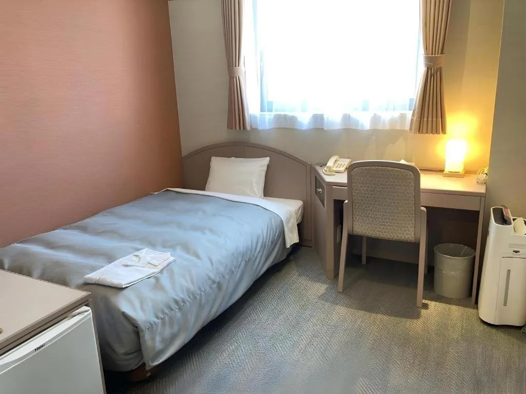 Bed in The Hamilton Sapporo Hotel