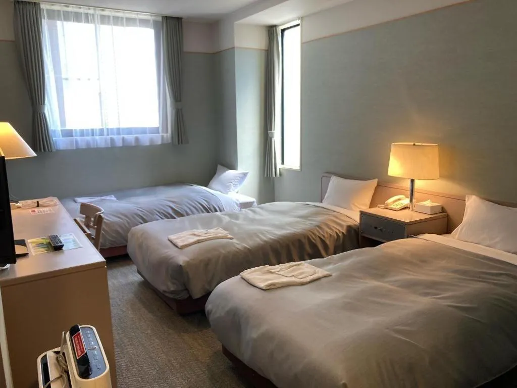 Bed in The Hamilton Sapporo Hotel