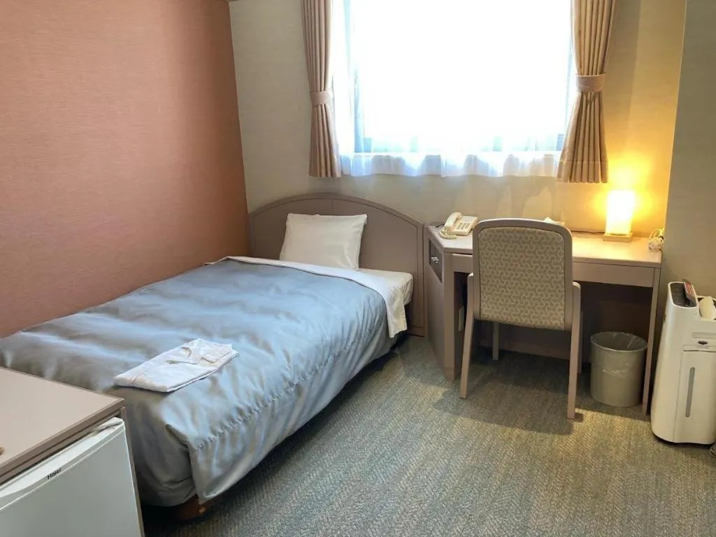 Bed in The Hamilton Sapporo Hotel