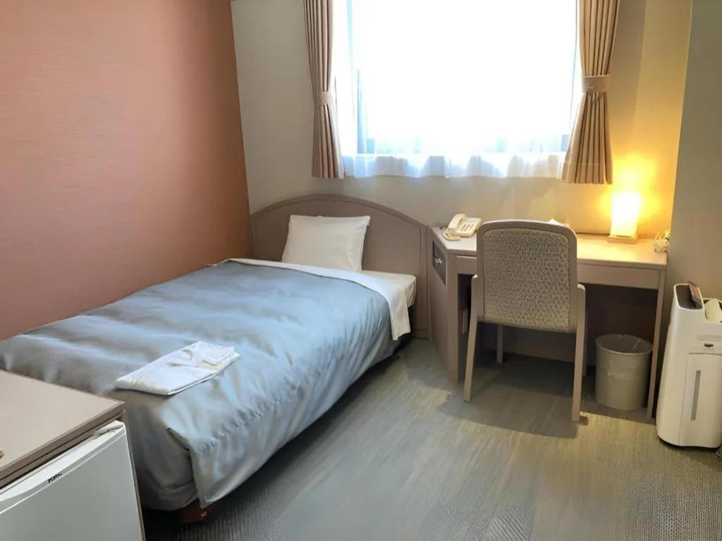 Bed in The Hamilton Sapporo Hotel