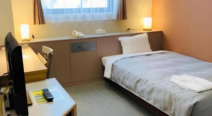 Bed in The Hamilton Sapporo Hotel