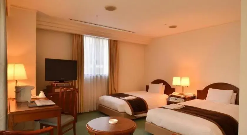 Bed in Nagasaki International Hotel Bed in Nagasaki International Hotel