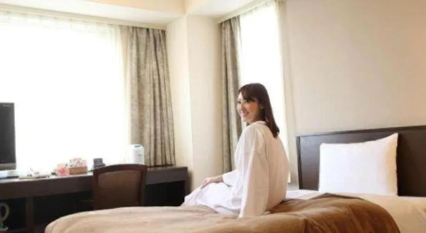 Bed in Hotel Park Side Hiroshima Peace Park