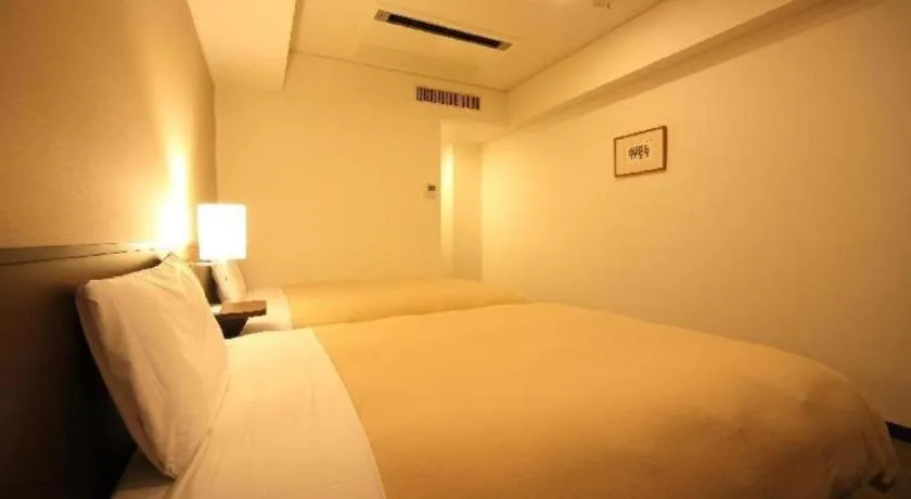 Bed in Hotel Park Side Hiroshima Peace Park