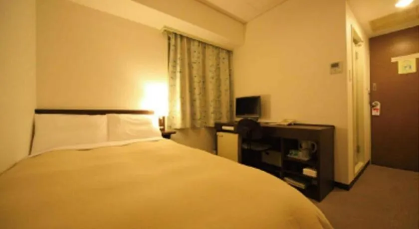 Bed in Hotel Park Side Hiroshima Peace Park