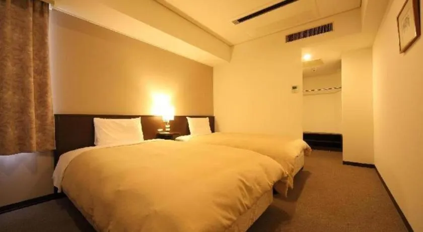 Bed in Hotel Park Side Hiroshima Peace Park