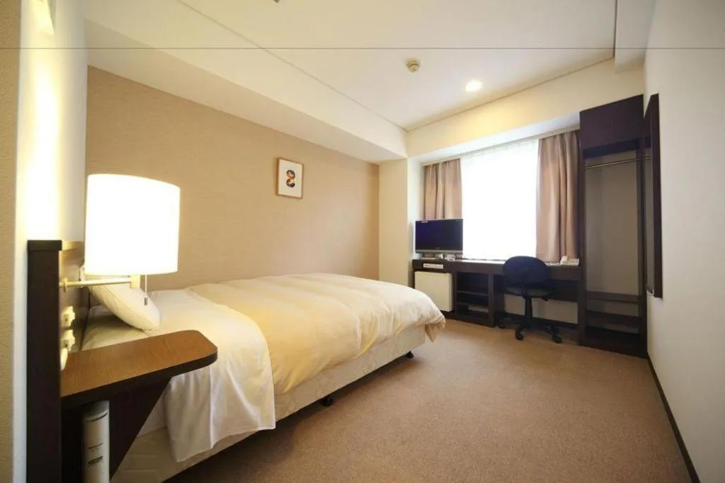 Bed in Hotel Park Side Hiroshima Peace Park