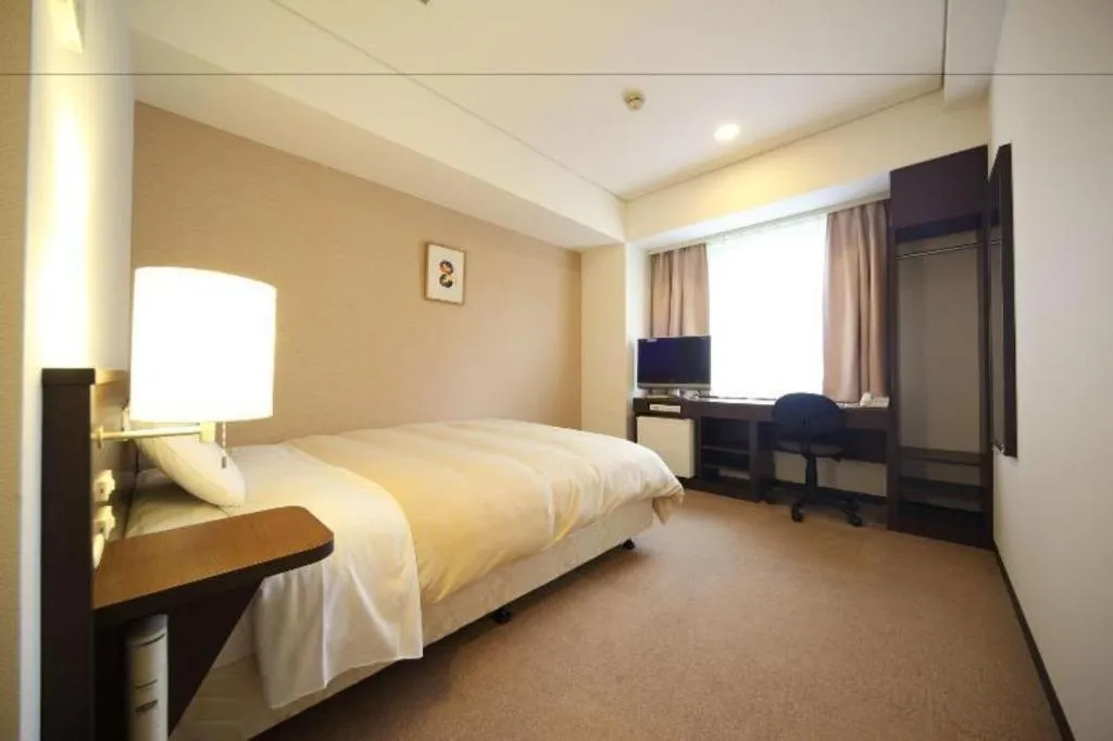 Bed in Hotel Park Side Hiroshima Peace Park