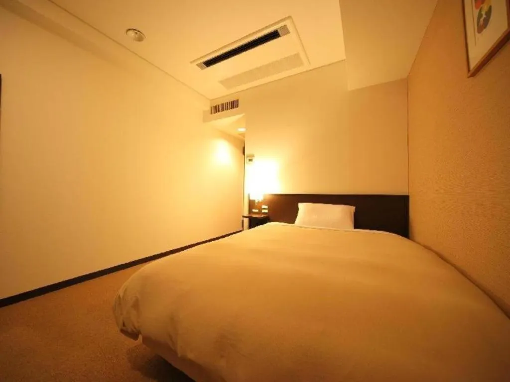 Bed in Hotel Park Side Hiroshima Peace Park