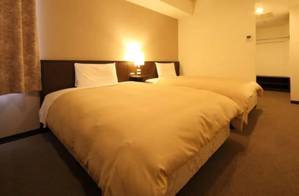 Bed in Hotel Park Side Hiroshima Peace Park