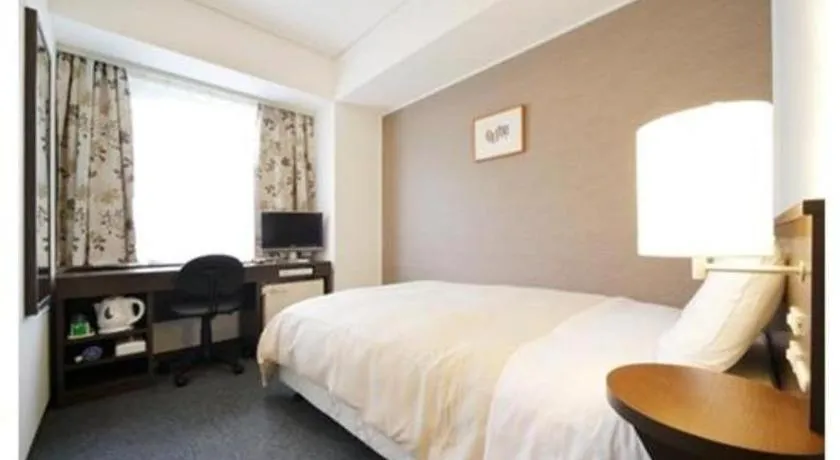 Bed in Hotel Park Side Hiroshima Peace Park