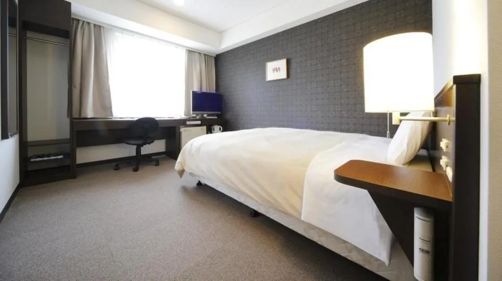 Bed in Hotel Park Side Hiroshima Peace Park