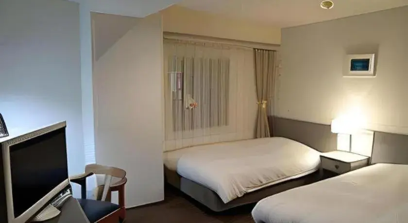 Bed in Hotel Ronshan Sapporo Bed in Hotel Ronshan Sapporo