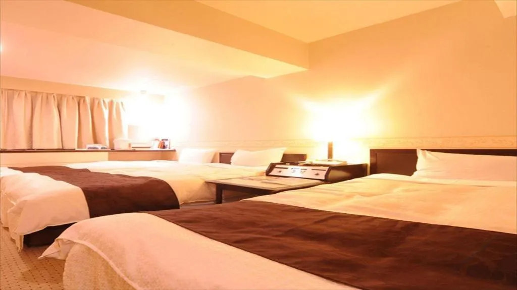 Bed in Hiroshima Kokusai Hotel