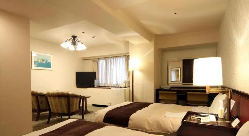 Bed in Hiroshima Kokusai Hotel