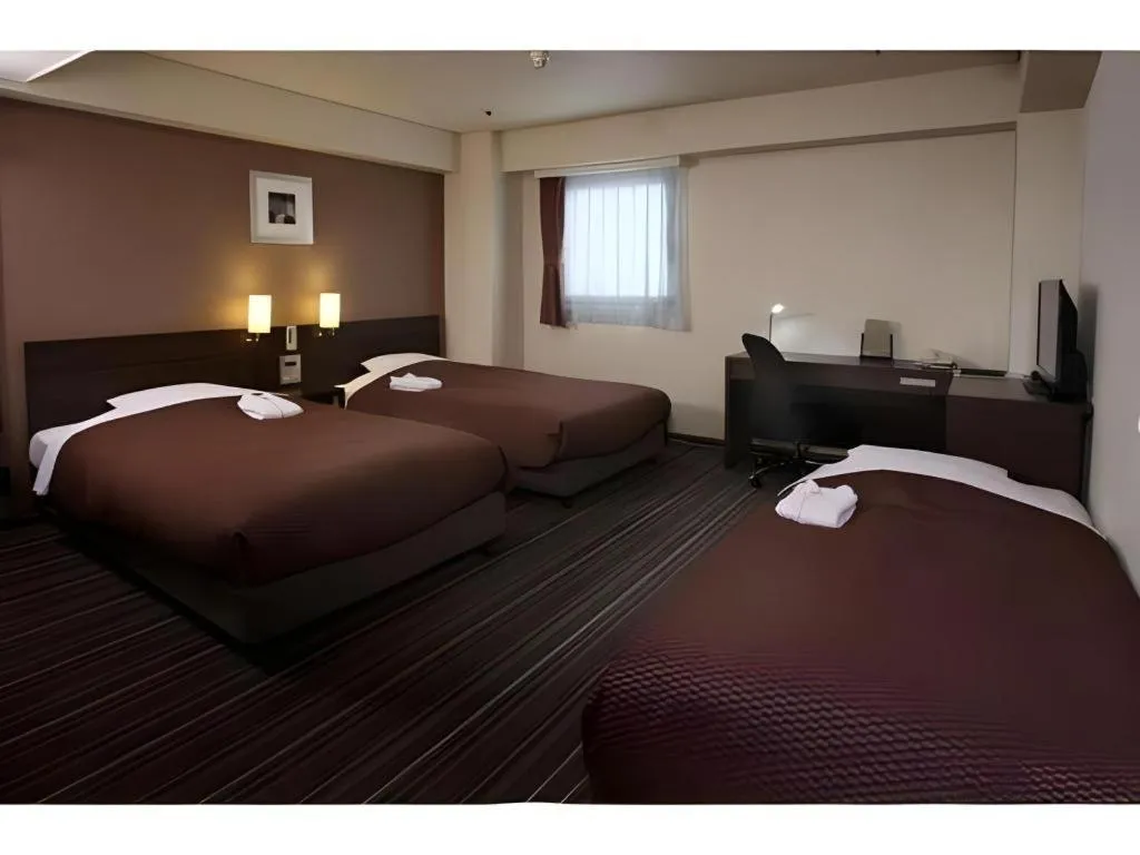 Bed in Daini Fuji Hotel