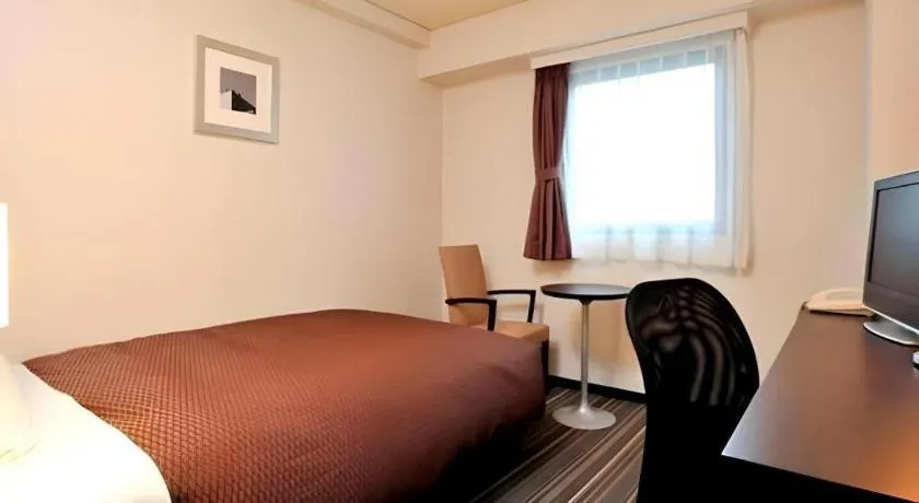 Bed in Daini Fuji Hotel