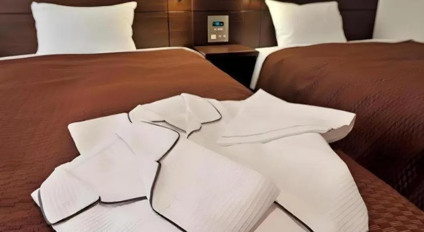 Bed in Daini Fuji Hotel