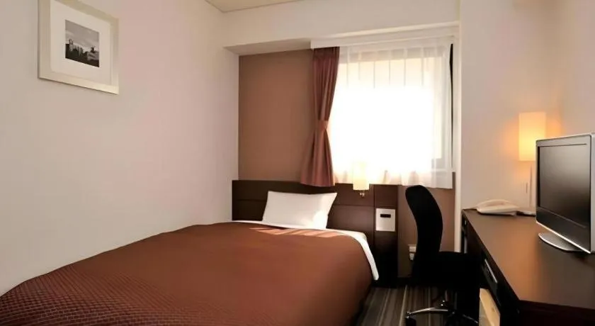 Bed in Daini Fuji Hotel