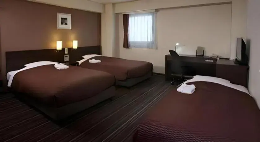 Bed in Daini Fuji Hotel Bed in Daini Fuji Hotel