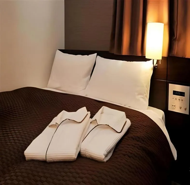 Bed in Daini Fuji Hotel