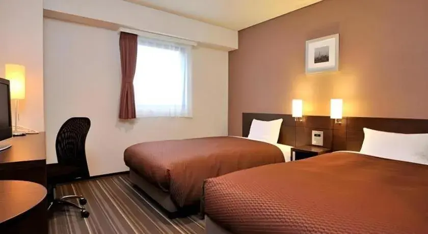 Bed in Daini Fuji Hotel Bed in Daini Fuji Hotel