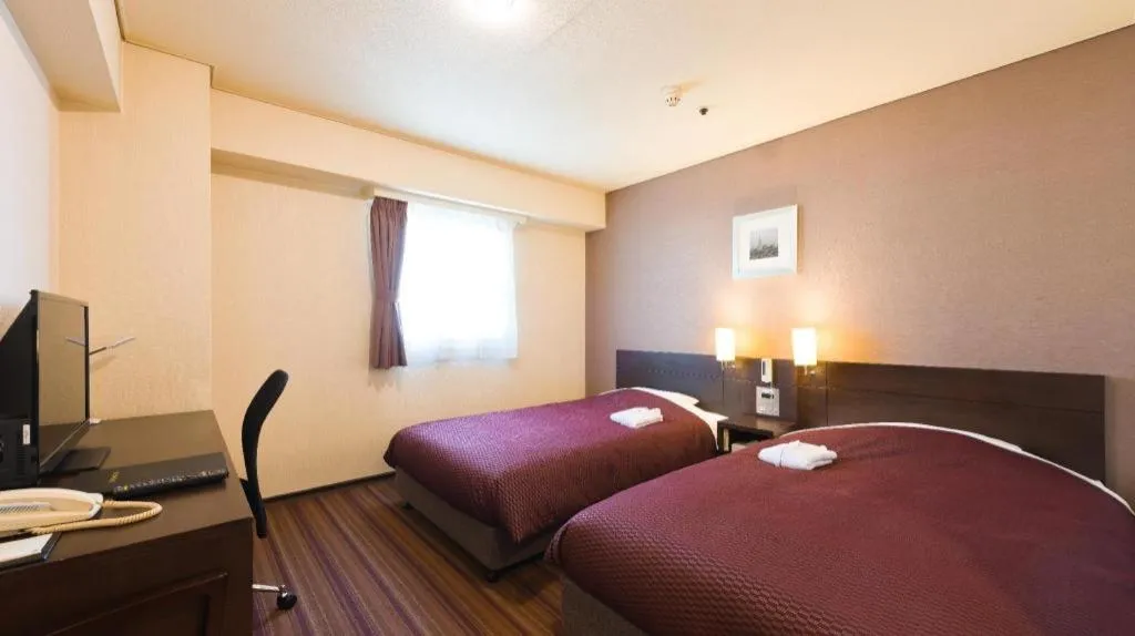 Bed in Daini Fuji Hotel