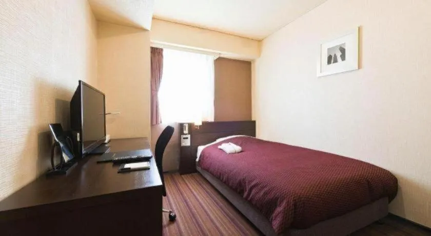 Bed in Daini Fuji Hotel